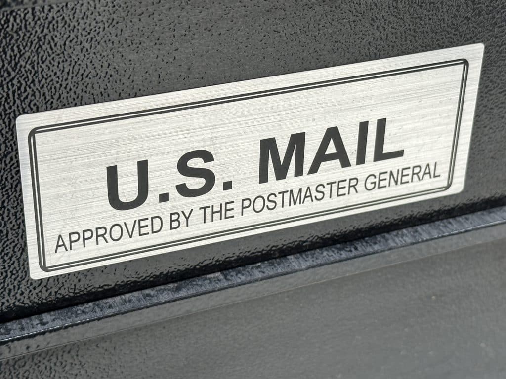 Both mailboxes feature plaques indicating they're approved by the Postmaster General | Upper East Site