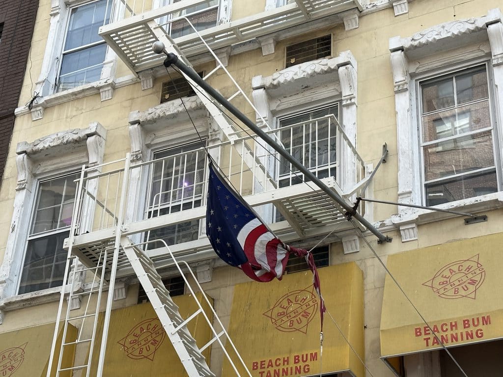 The Comic Strip's once proudly displayed American flag is now tangled | Upper East Site