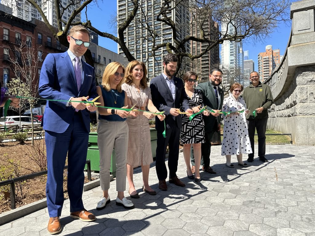 Ribbon-cutting at Honey Locust Park featuring DOT Manhattan Borough Commissioner Ed Pincar, NYC Parks Commissioner Sue Donoghue, Council Member Julie Menin, Assemblyman Alex Bores, DEP Deputy Chief Operating Officer Kim Cipriano, NYC Parks Manhattan Borough Commissioner Anthony Perez and Community Board 8 Parks & Waterfront Co-Chair Judy Schneider | Upper East Site