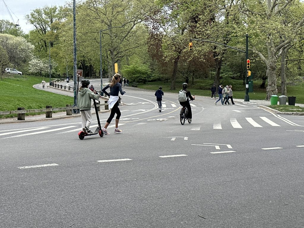 A girl on a scooter (left) nearly struck a runner Tuesday morning in Central Park | Upper East Site