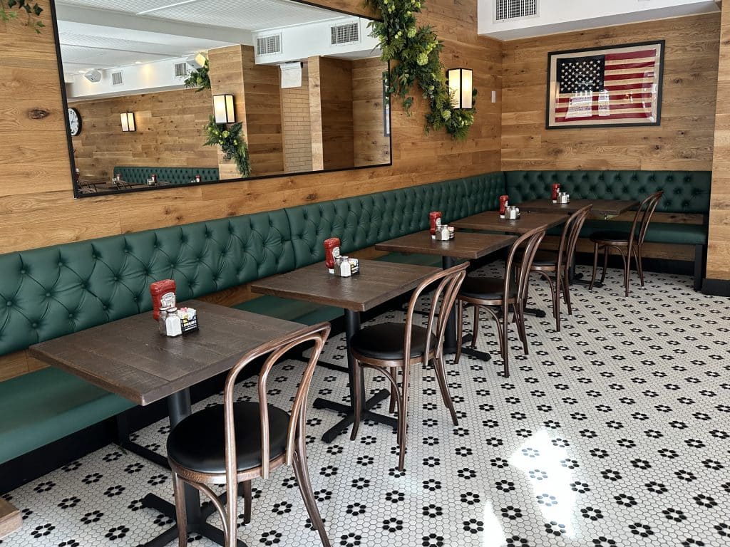 Upholstered seating can be found along Green Kitchen's southern wall | Upper East Site