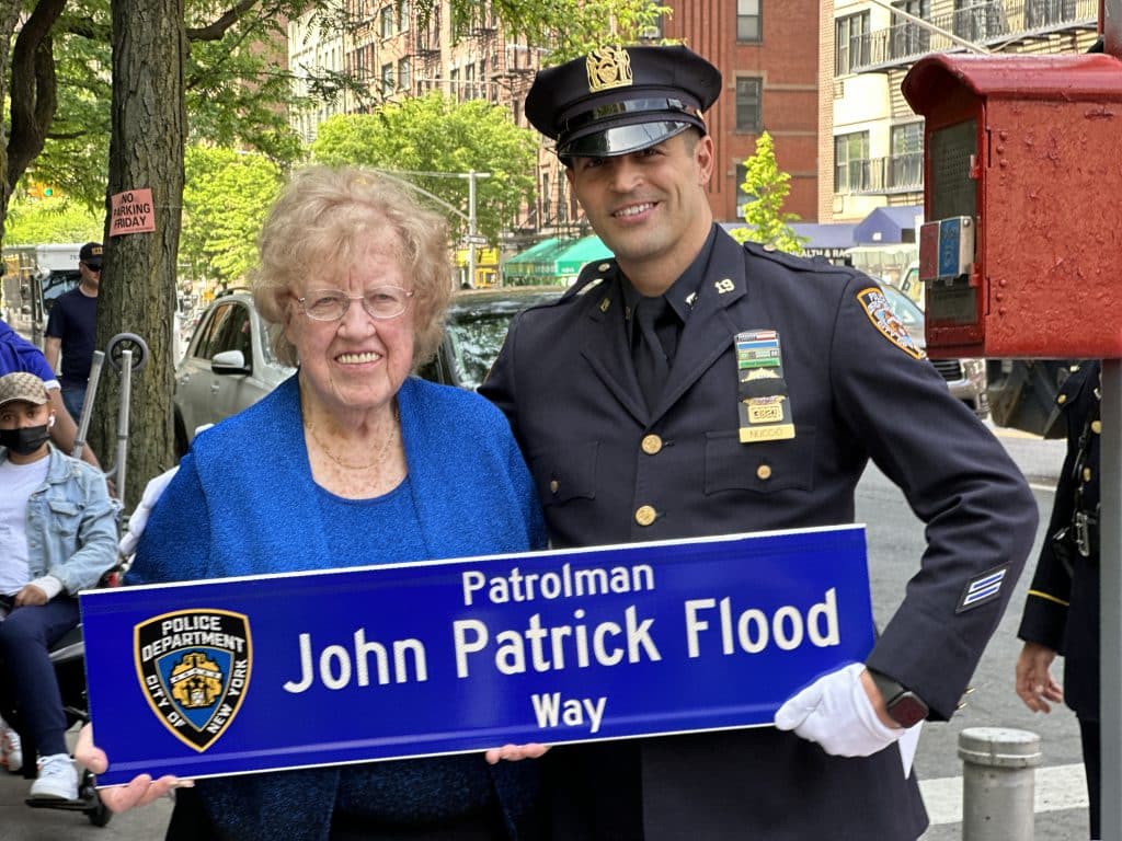 Patrolman John P. Flood's granddaughter Maureen O'Grady and Detective Anthony Nuccio from the NYPD's 19th Precinct | Upper East Site