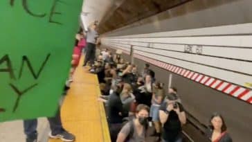 Protesters blocked the train tracks inside the 63rd Street-Lexington Avenue subway station on Saturday | Talia Jane @taliaotg