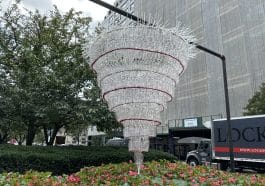 Four giant chandeliers made of recycled water bottles are part of an art installation on Park Avenue | Upper East Site