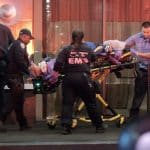 The disturbed man wailed as he was wheeled out of the Upper East Side hotel handcuffed, wearing a spitting prevention hood , while strapped to a gurney | Dakota Santiago/FreedomNews.tv