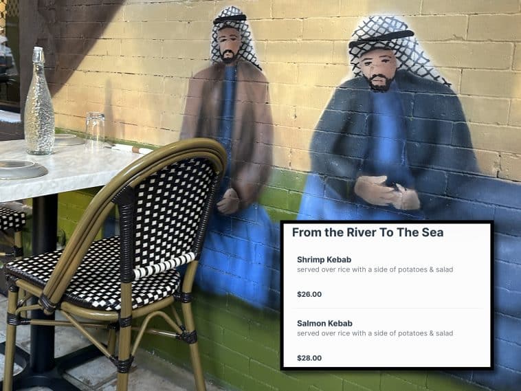 Photo shows a mural painted on a restaurant wall of two men wearing traditional Palestinian keffiyeh’s. A set dining room table is next to the mural. Inset photo shows an menu reading ‘From the River to the Sea’ and listing two shrimp dishes and their prices.