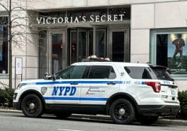 Photo shows an NYPD SUV parked outside Victoria's Secret store.