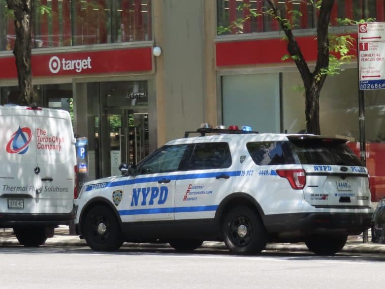 Photo shows an NYPD cruiser in front of a Target store.