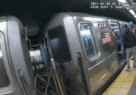 Video shows a woman whose face is obscured running after the man in blue inside a subway station.